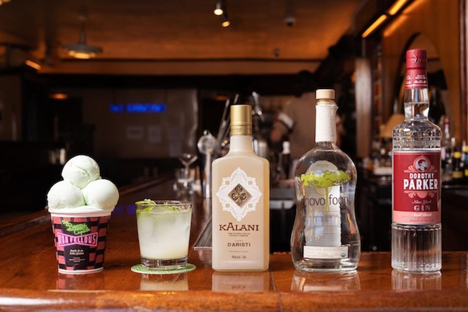 Bottles of alcohol and a carton of ice cream