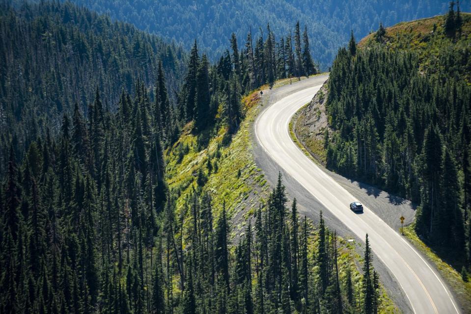 Scenic View Of Mountains and road Against Sky. Olympic National Park, USA.