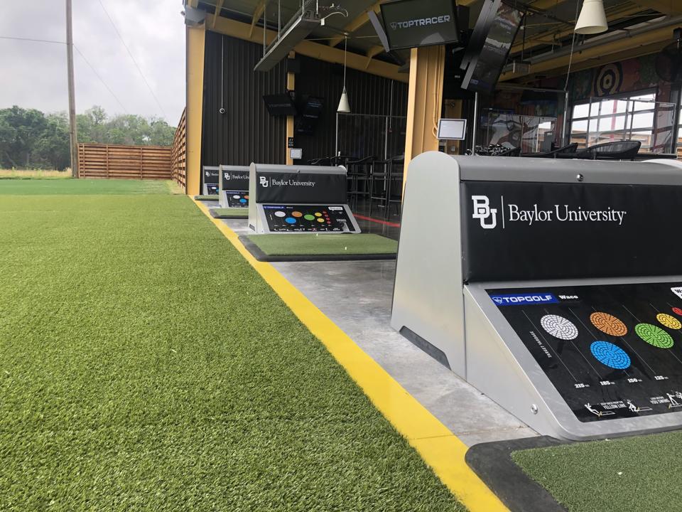 Permanent Baylor branding on four VIP bays at Topgolf Waco