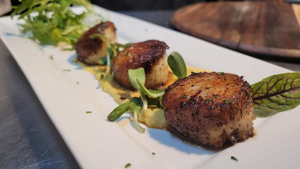 seared jumbo scallops on offer at a new farm-to-table restaurant in upper manhattan