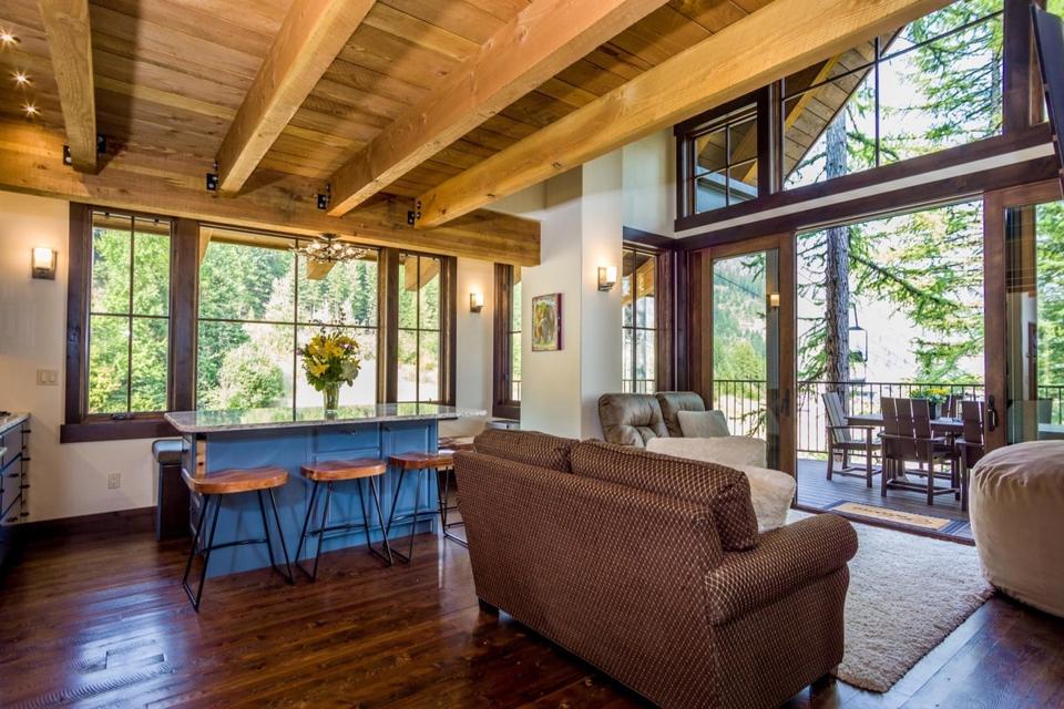 interior and living room ponderosa chalet treehouse in montana's whitefish