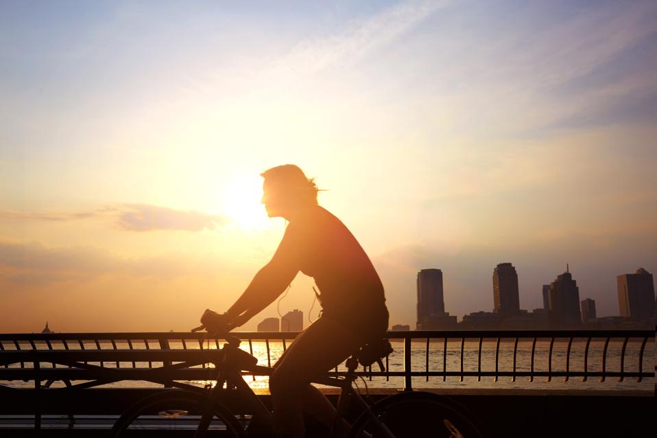 Commuter cycling to work in the morning.
