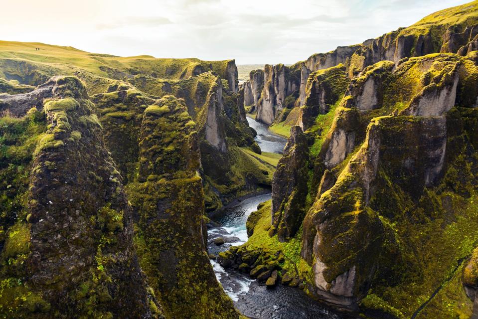 A landscape of mountains and rivers in Iceland.