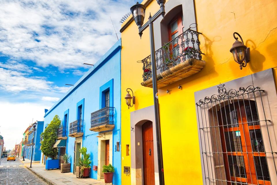 A street with colorful buildings on a travel tour.