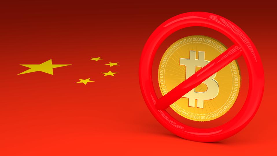 Prohibitive sign with a bitcoin inside on a Chinese flag