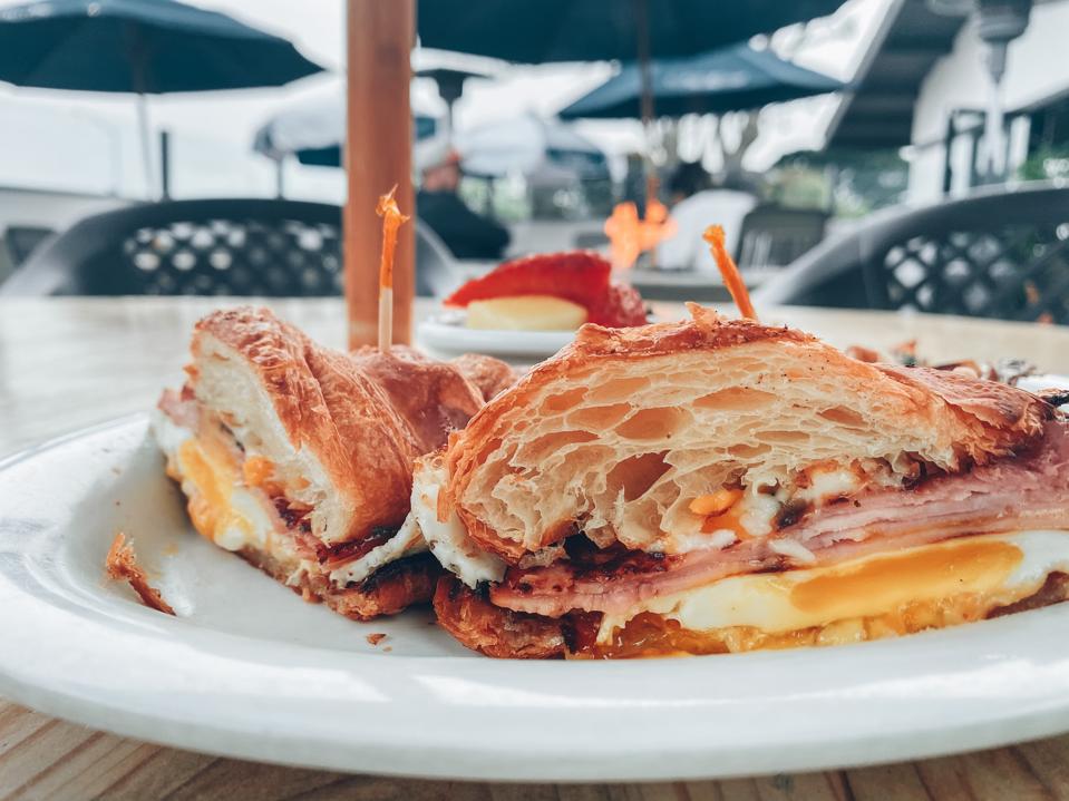 First Awakenings' Ham, Cheese and Egg Croissant Sandwich.
