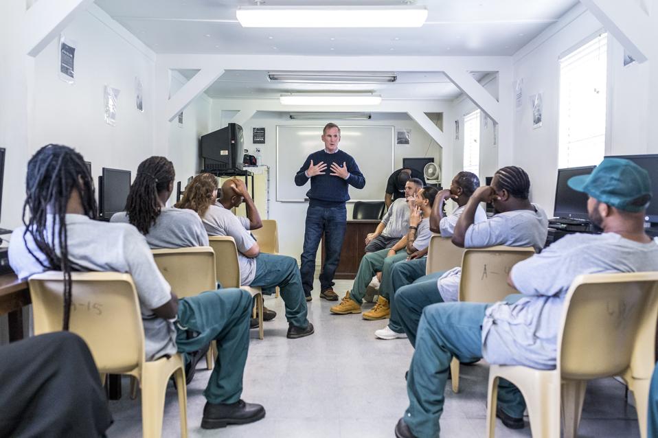Brian Hamilton teaching inmates