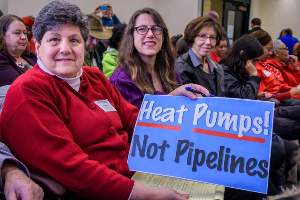 Protesters disrupting Con Edison at the PSC meeting. The...