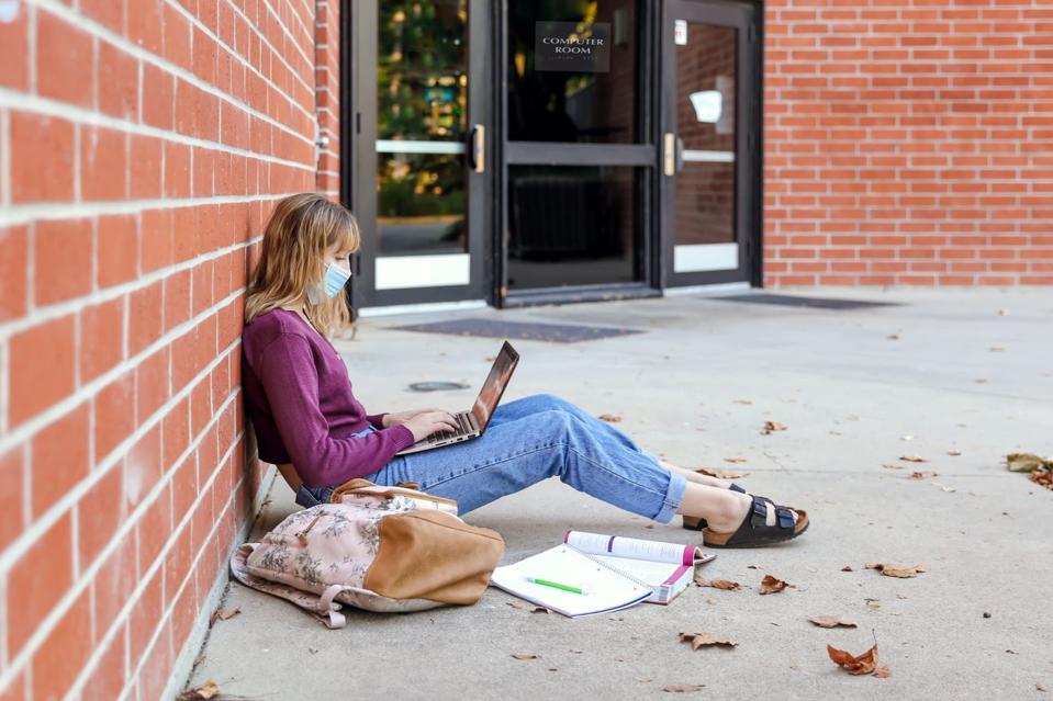 Student studying on campus