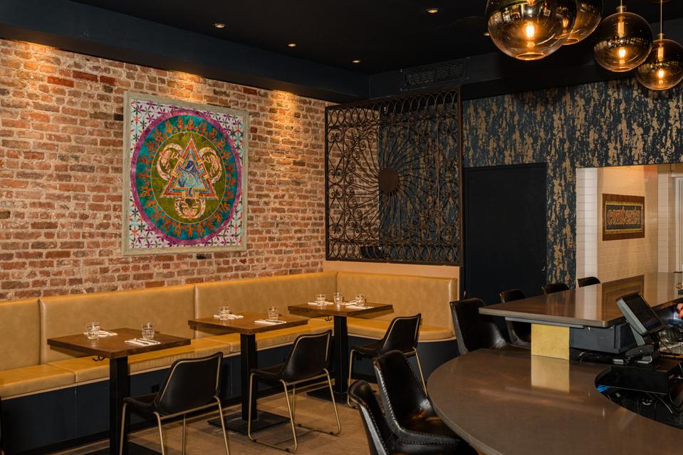 Fewer tables and a wider aisle allow greater accessibility at Contento in East Harlem.
