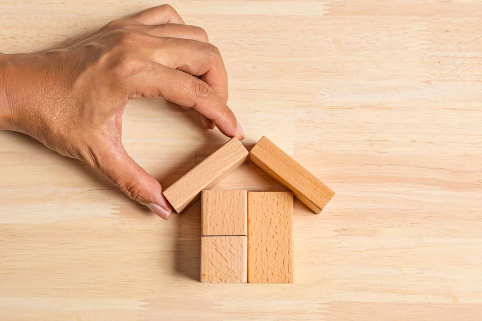 Hand building house