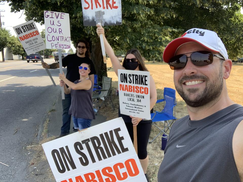 BCGTM Local 364 Vice President Mike Burlingham with co-workers in Portlan, Oregon on the picket line.