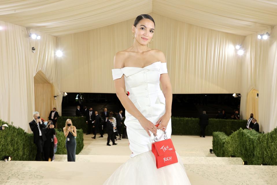 tax the rich dress designer The Controversy Over AOC's 'Tax The Rich' Dress, Explained