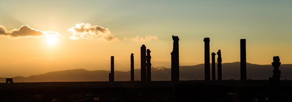 Silhouettes of columns in Persepolis during Sunset, near Shiraz, Fars Province, Iran