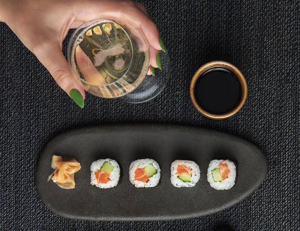 Japanese sushi and glass of champagne