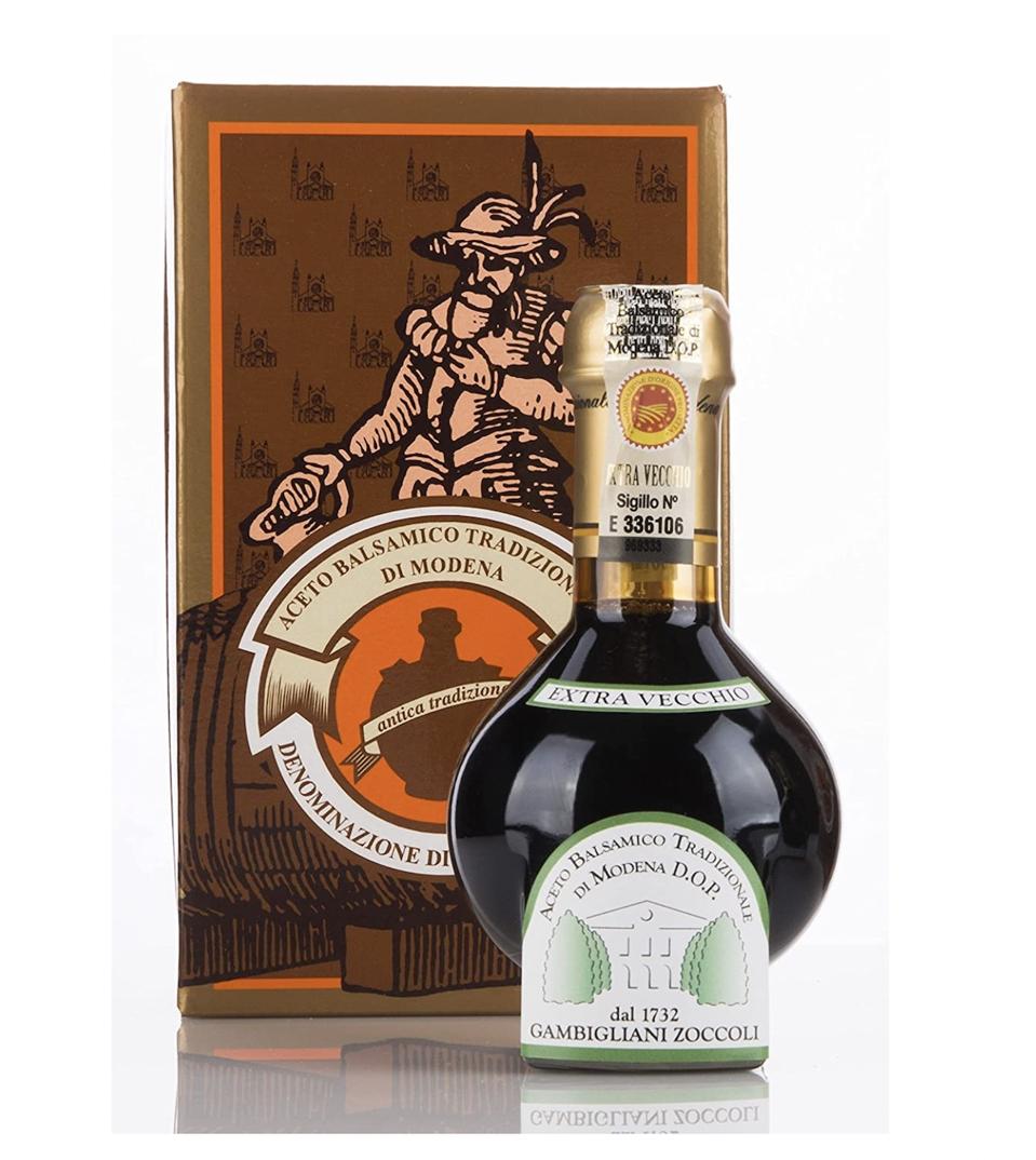 Traditional balsamic vinegar of Modena aged over 25 years packaged in the official box of the Consortia