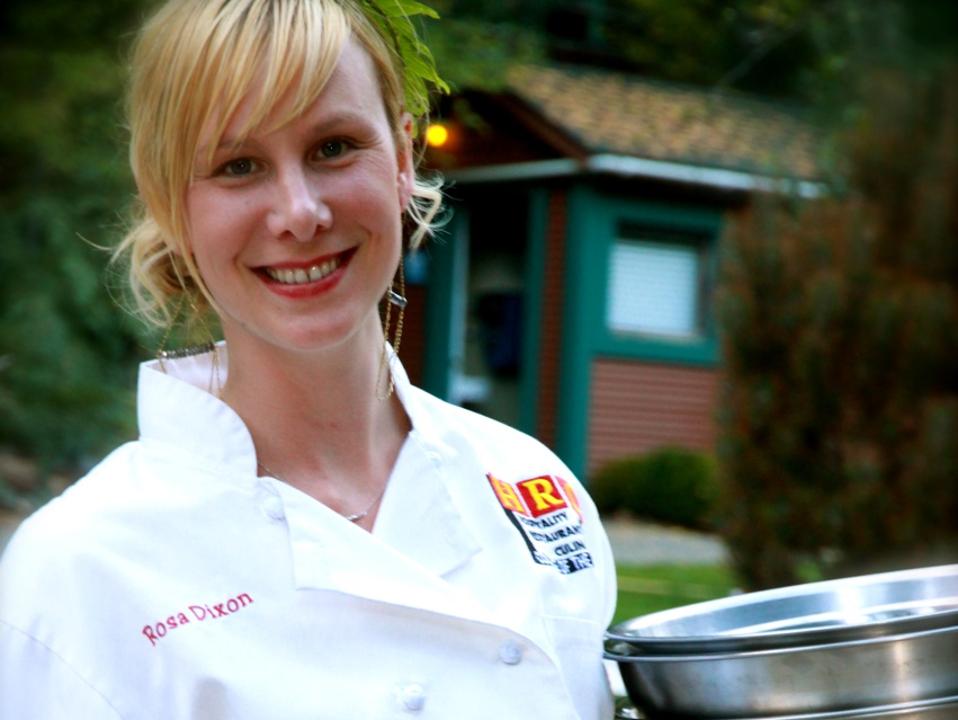 Headshot of Dixon in chef's apron