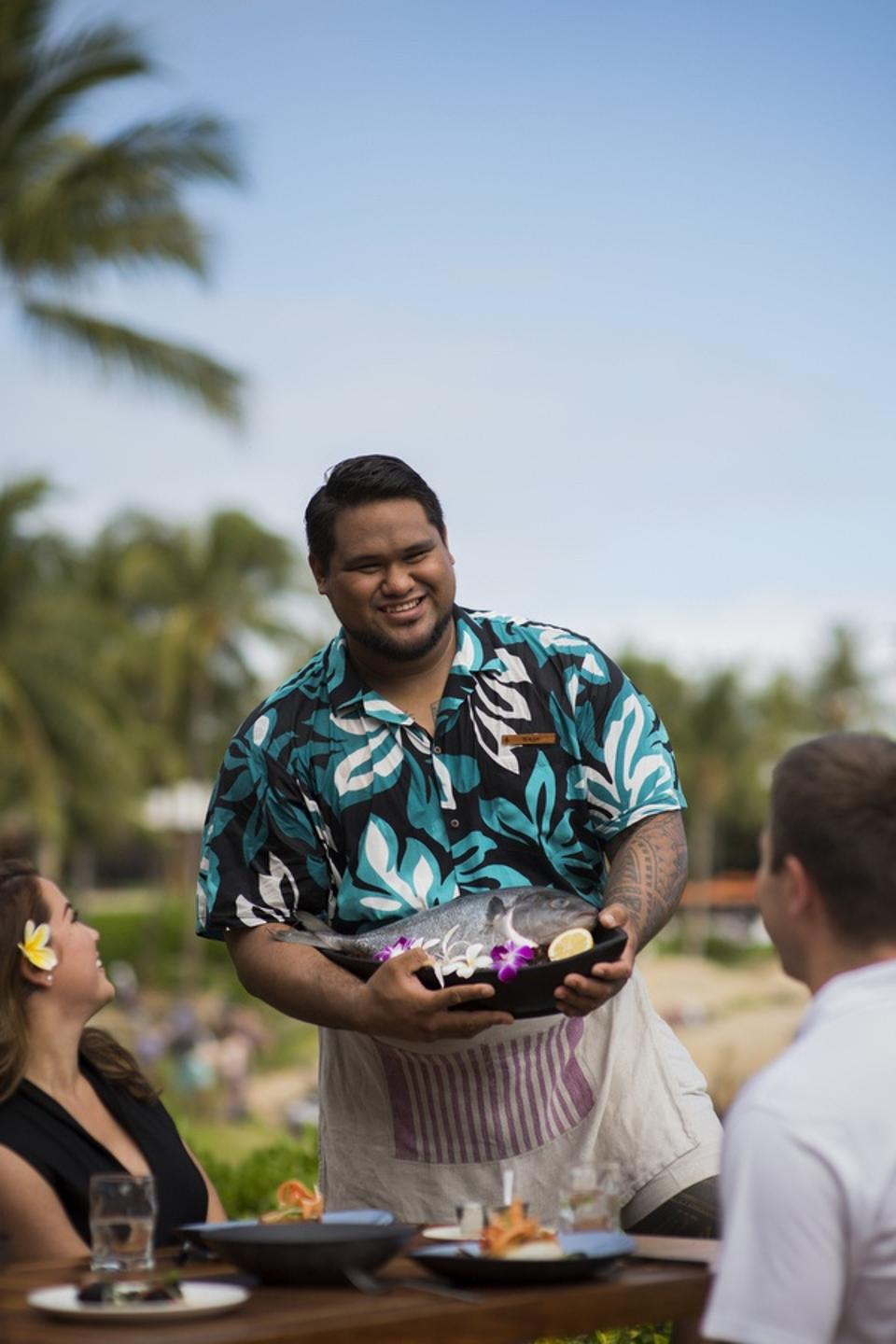 Saui Matagiese fish sommelier at Mina's Fish House on Oahu
