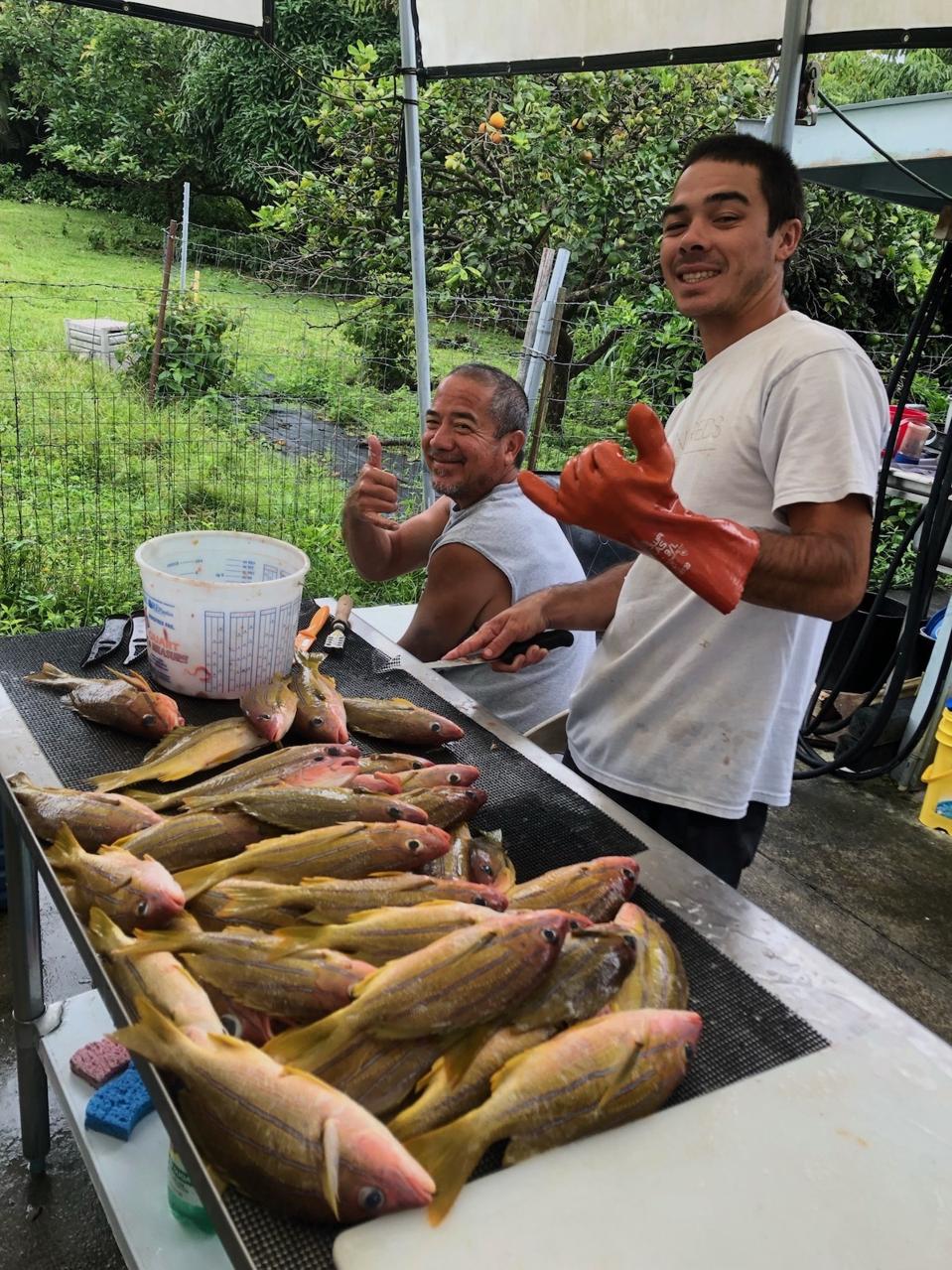 Hawaii fishers Noah and Uncle Keoni AhChong 