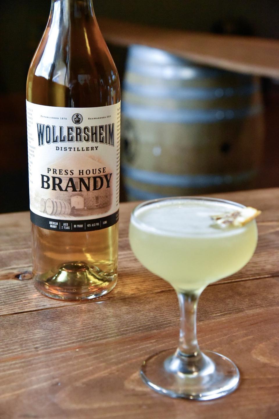 bottle of brandy and side car cocktail