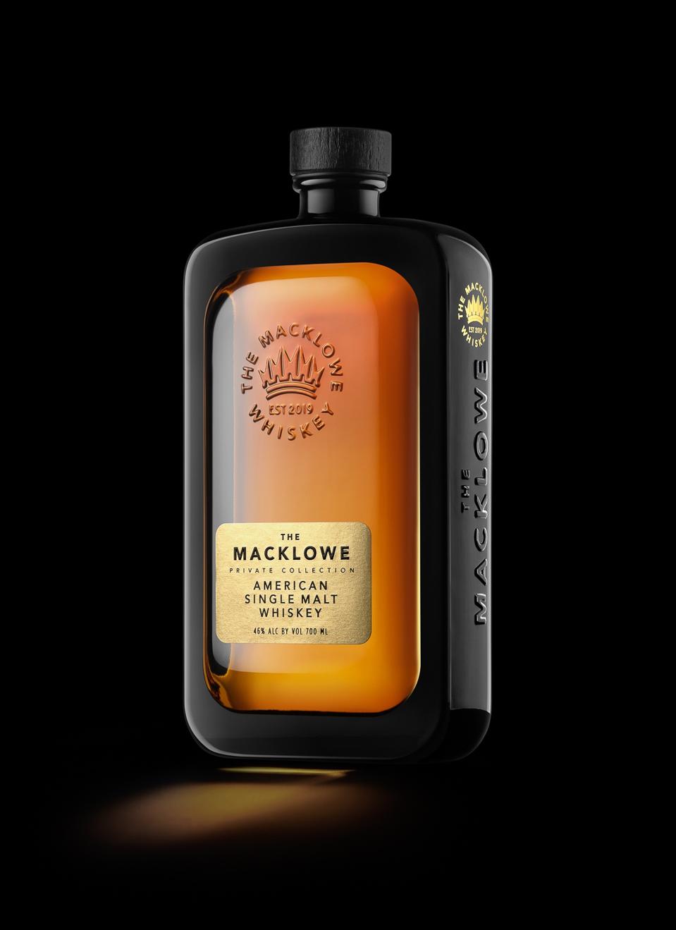 bottle of whiskey with black background