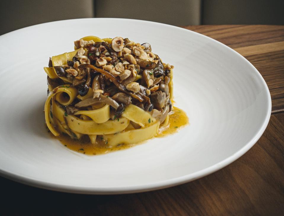 pasta with mushrooms on white plate
