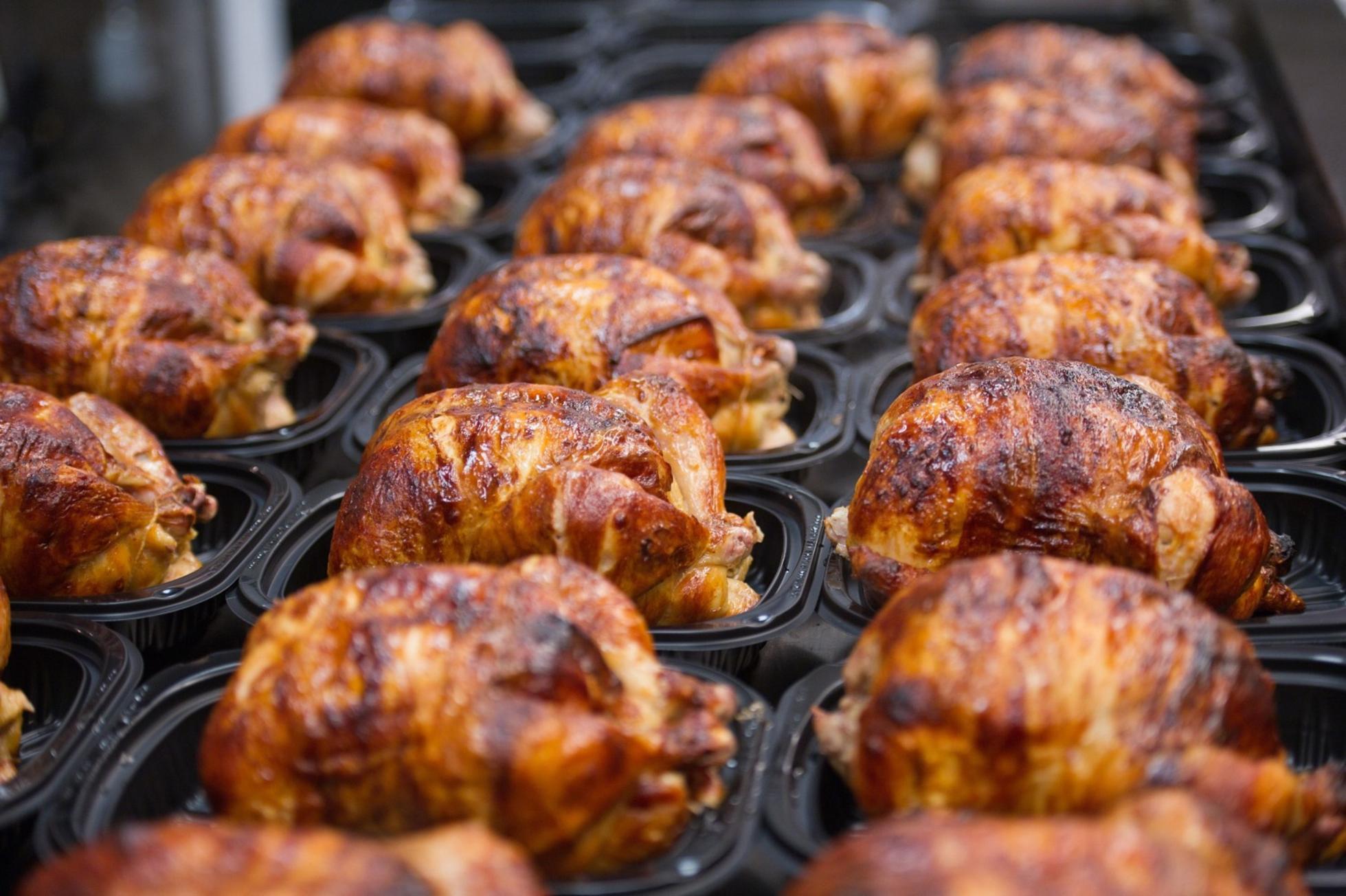 Cooked rotisserie chickens are displayed for sale at a Costco store in San Francisco.
