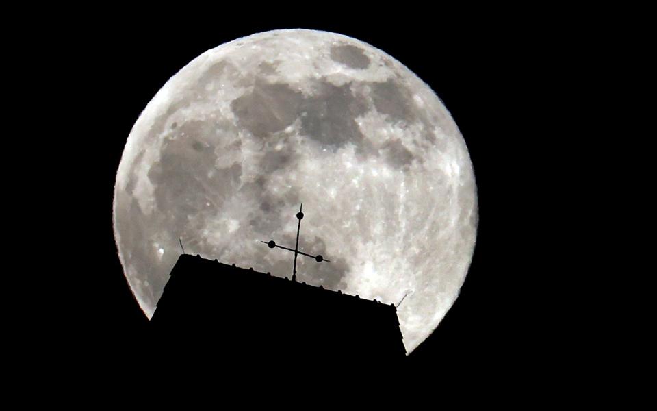 In Photos: See A Dazzling ‘Pink Moon’ Rise For Easter…