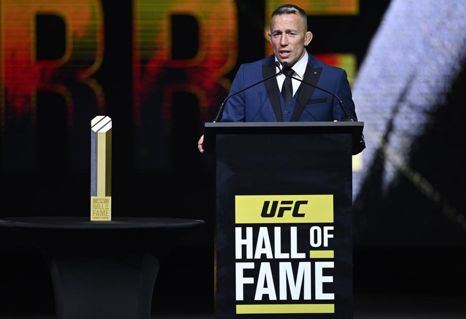 Georges St-Pierre speaks at a UFC Hall of Fame ceremony