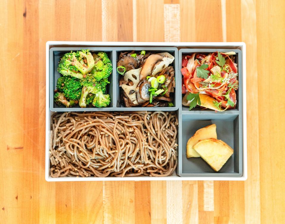 Soba noodle bento box from Bento Picnic with assorted salads and vegetables.