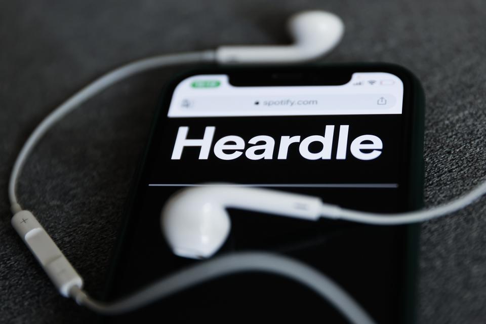 Ilustraciones fotográficas de Spotify y Heardle