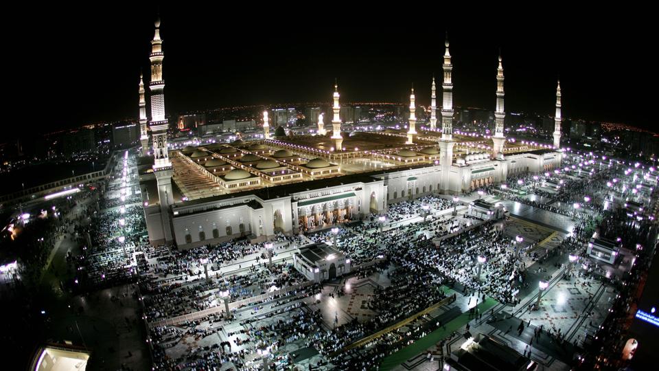 Muslims arrive on a pilgrimage to the landmark mosque of Medina.
