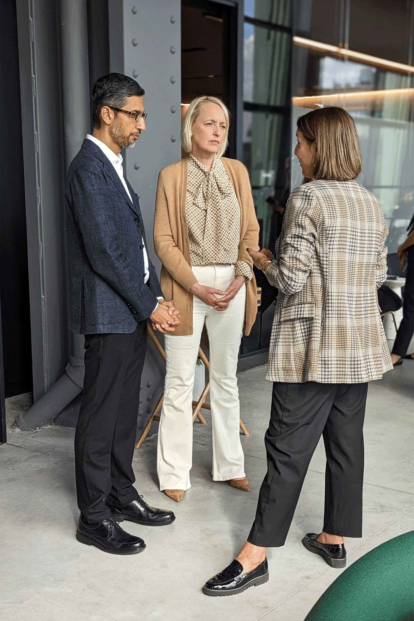 Sundar Pichai and Julie Sweet are talking to Jenna Gilbert.