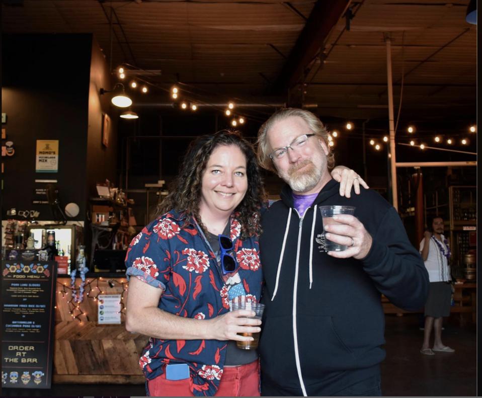 Amy with her husband and co-founder, Rob Cartwright, at the Southeast Austin brewery.