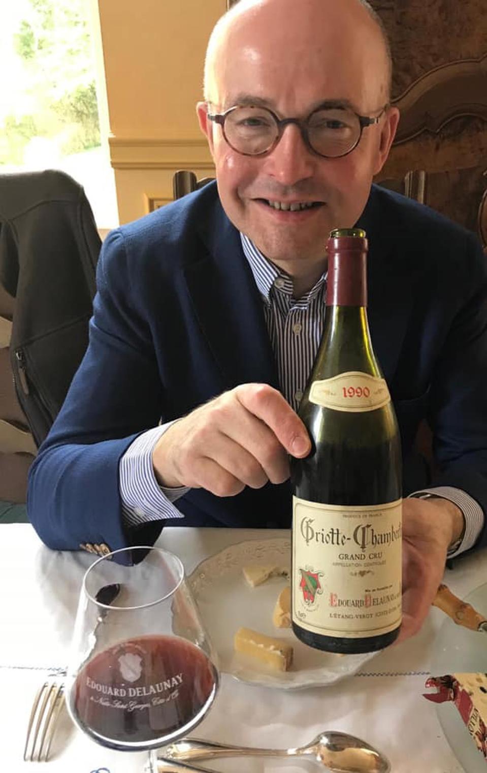 Laurent Delaunay holding a bottle of 1990 Edouard Delaunay, the last vintage his father made  Photo Credit Edouard Delaunay