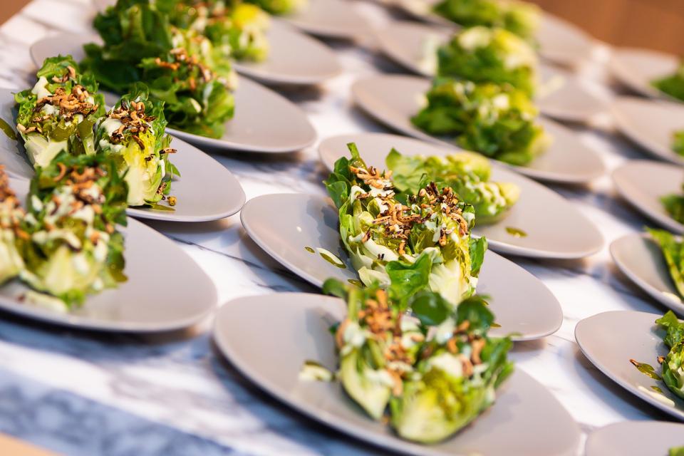 Uchi salads on white plates