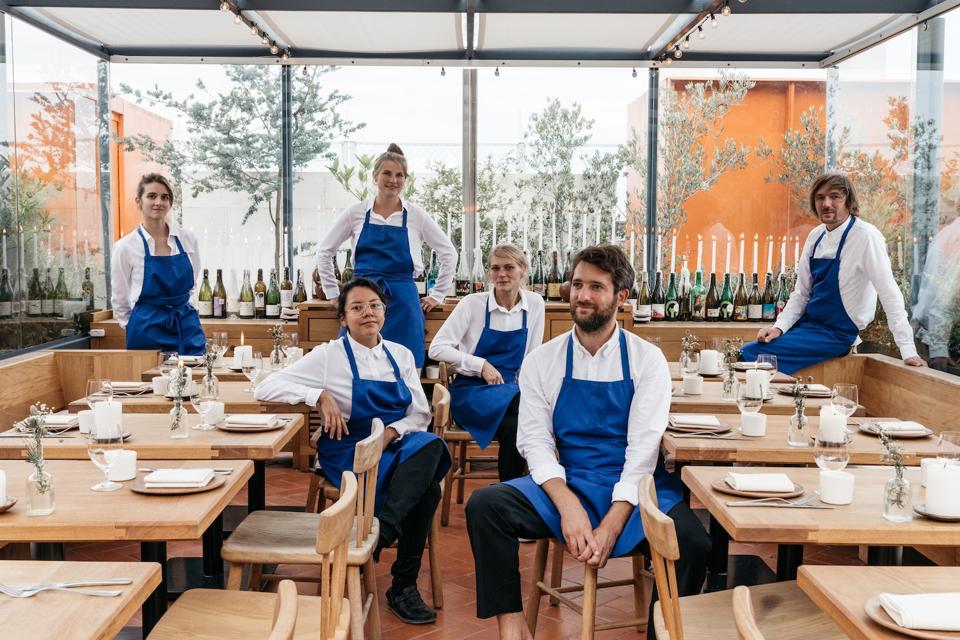 chefs in blue aprons