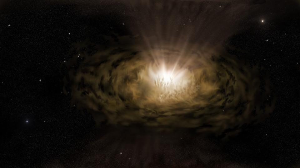 An artist’s impression of what the dust around an active galactic nucleus might look like seen from a light year away. 