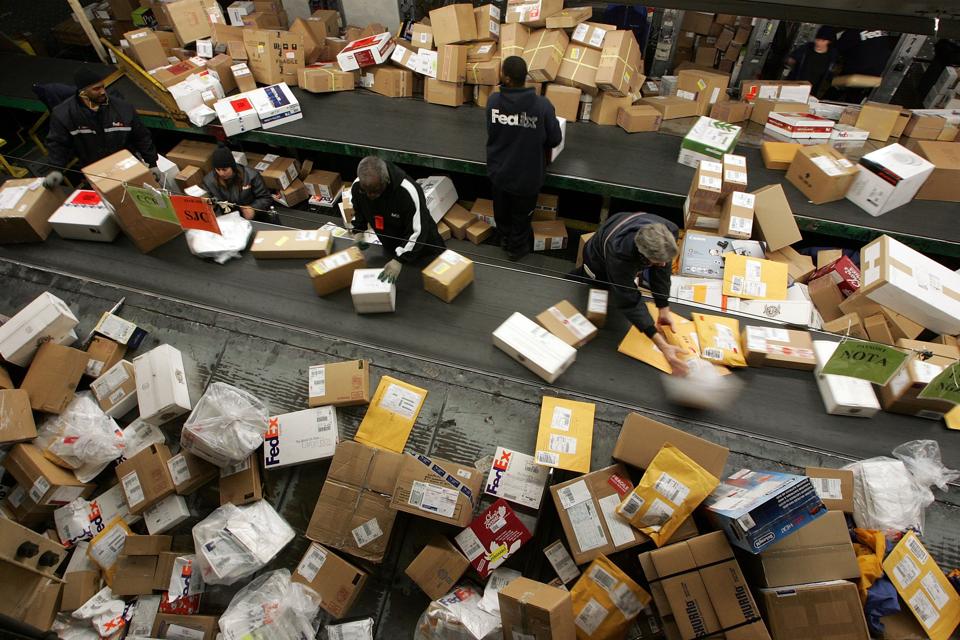 Fed Ex Estimates Record Day For Shipping