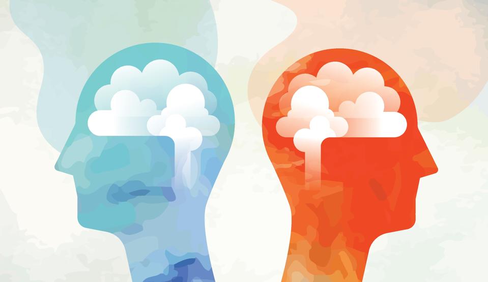 Dos cabezas con cerebro mirando al lado opuesto