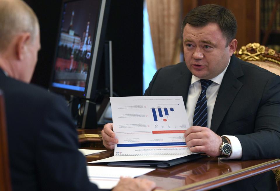 Russia Putin and Pyotr Fradkov of PSB
