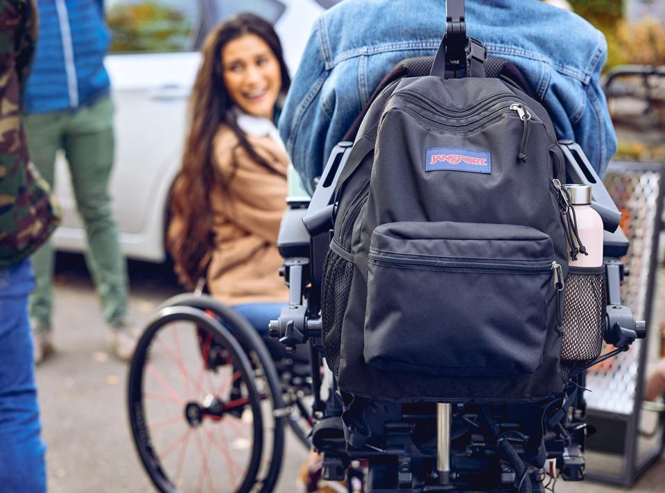 JanSport Central Adaptive Backpack on back of wheelchair