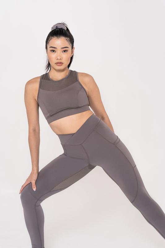 Woman modeling Oya's femtech apparel line.