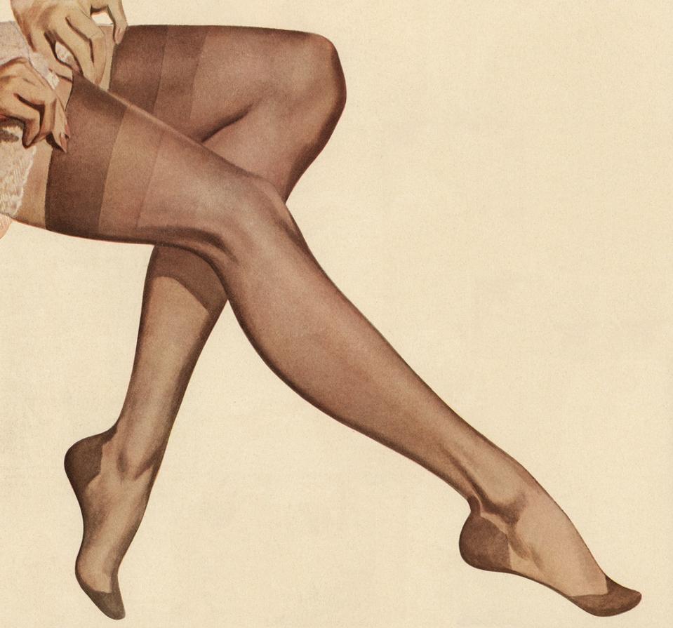 Woman's Legs In Sheer Nylons