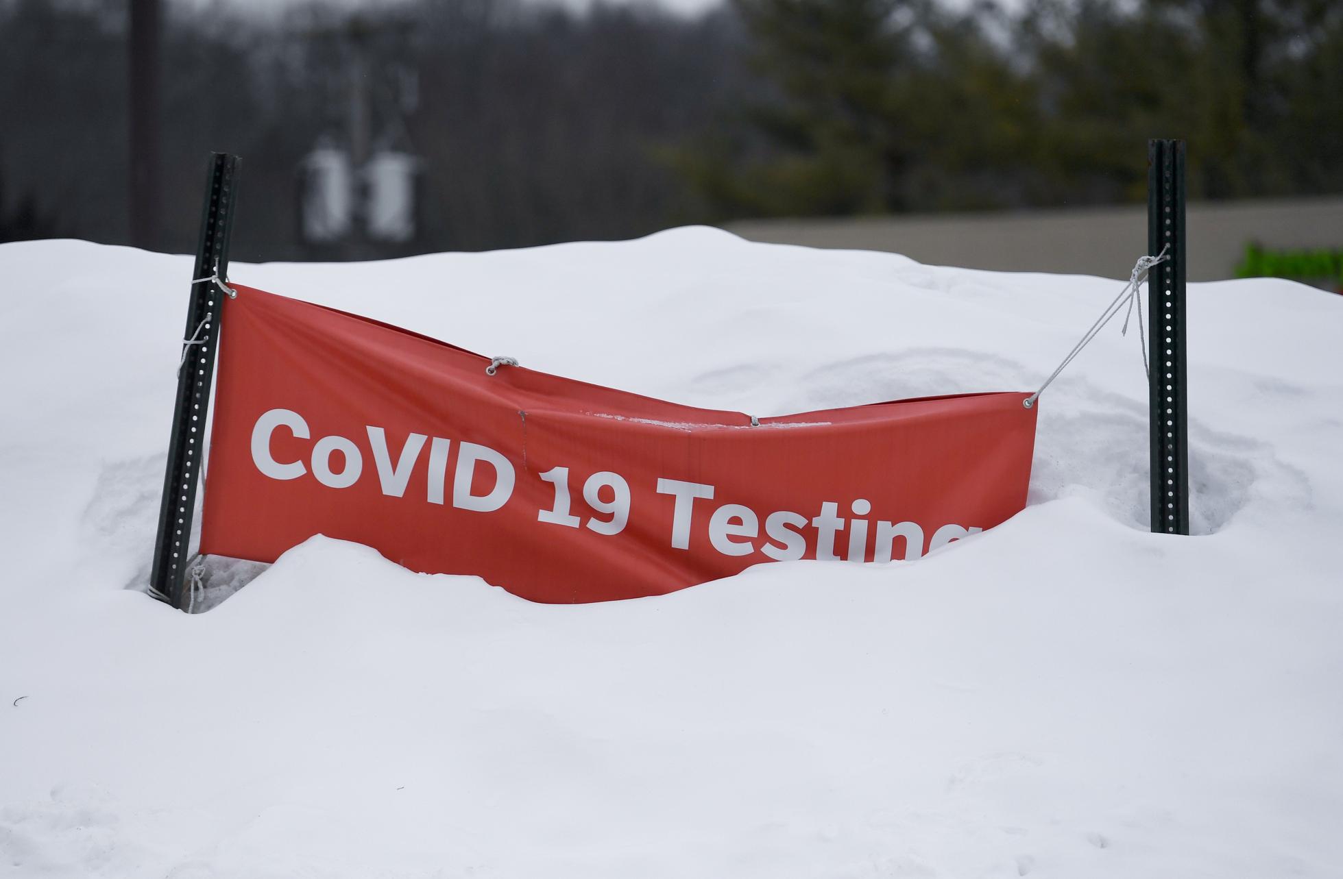 Sign For COVID-19 Testing In Snow Drift Along Road In Pennsylvania