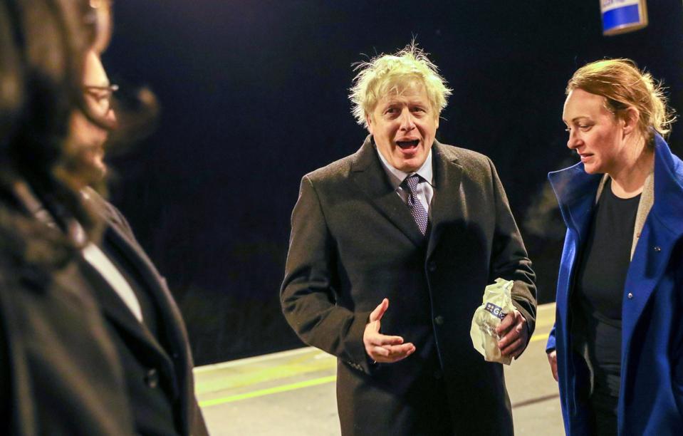 BRITAIN-POLITICS-EU-BREXIT-CONSERVATIVE. Former British prime minister Boris Johnson with a Greggs sausage roll. 