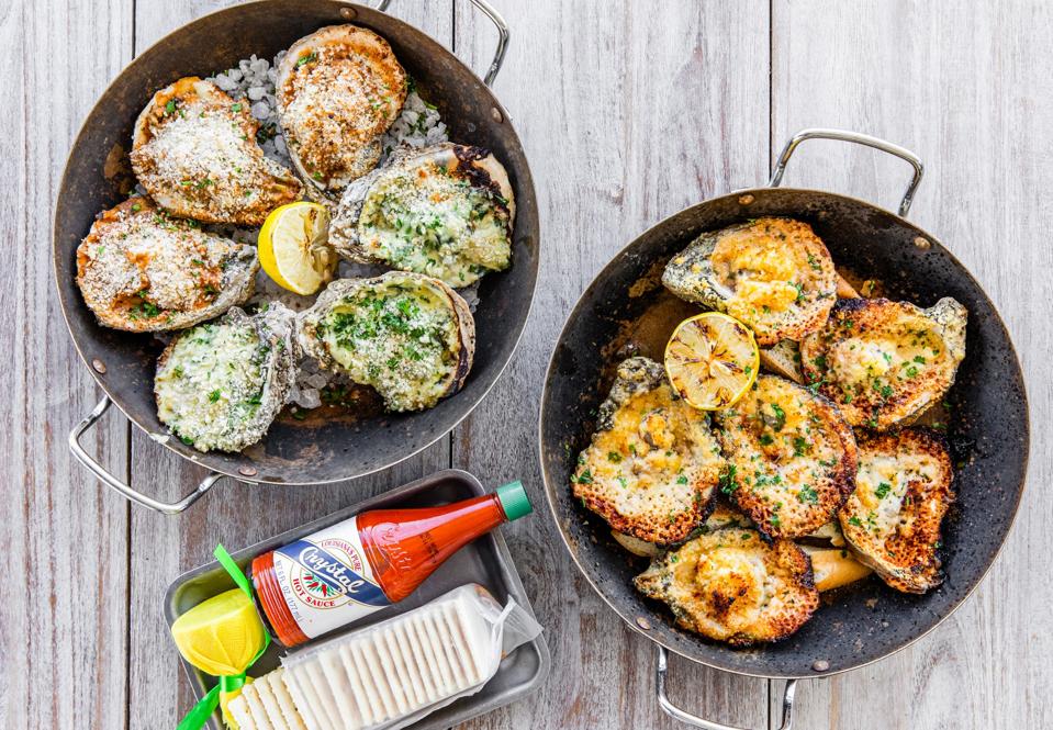 Two platters of grilled Oysters