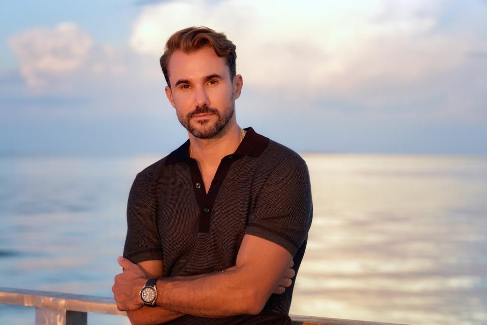 Raz Halili with the ocean in background.