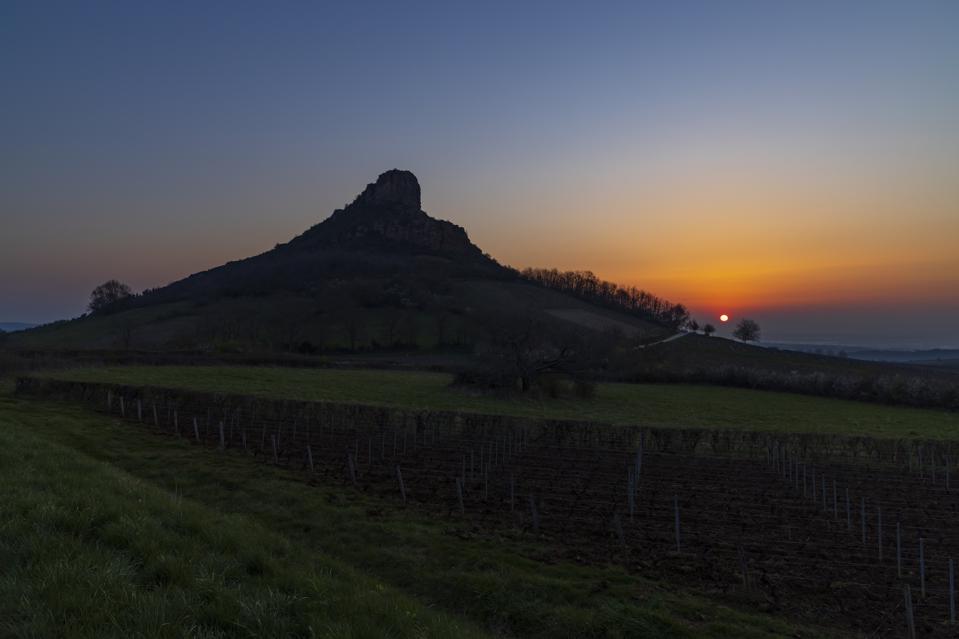 Rock of Solutre with vineyards, Burgundy, Solutre-Pouilly, France