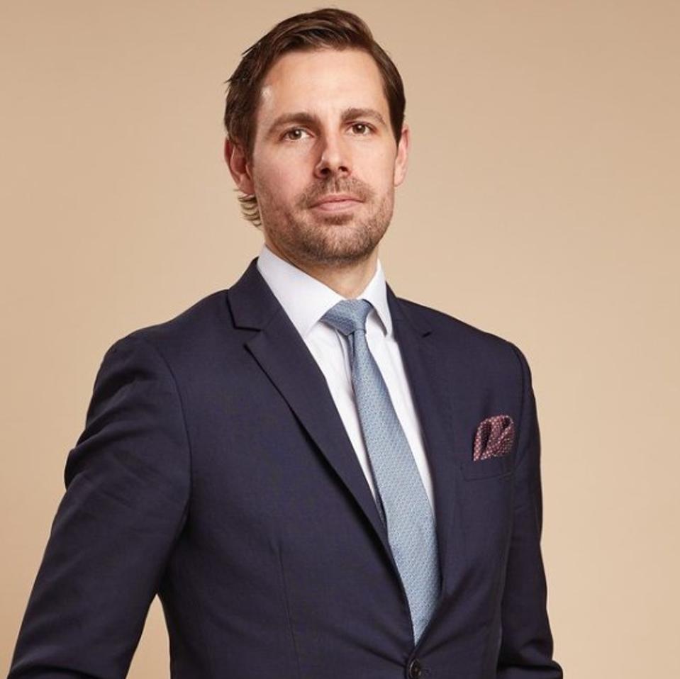 Head and shoulders of Harrods Ashley Saxton